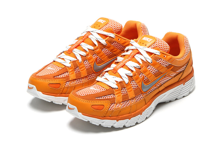 Nike | P-6000
Style # HQ3641-886
Color : Kumquat / Metallic Silver / Magma Orange