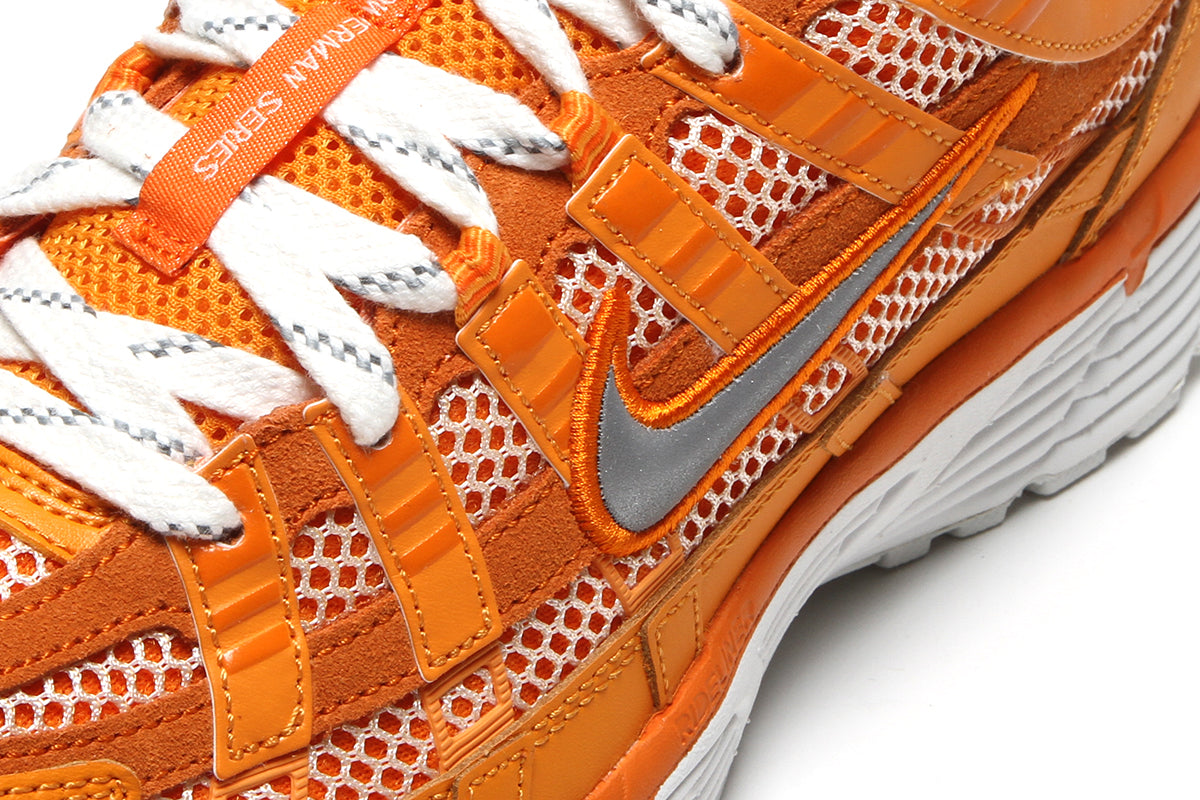 Nike | P-6000
Style # HQ3641-886
Color : Kumquat / Metallic Silver / Magma Orange