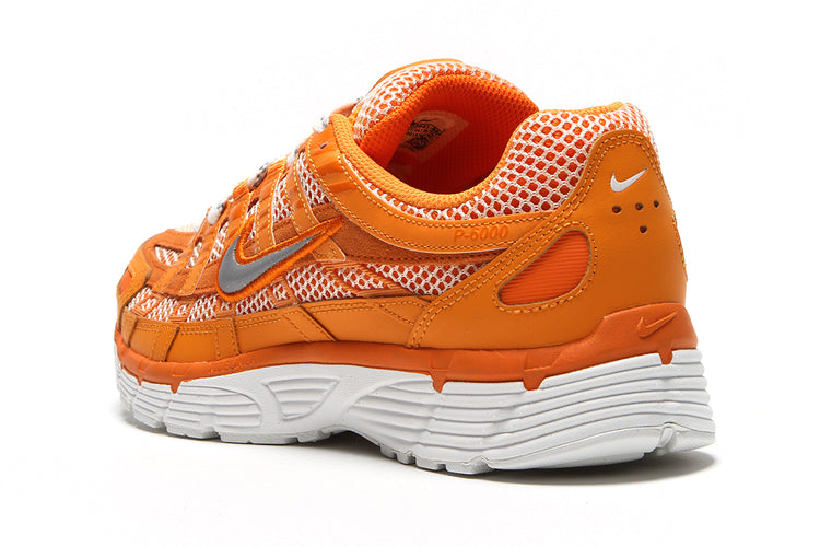 Nike | P-6000
Style # HQ3641-886
Color : Kumquat / Metallic Silver / Magma Orange