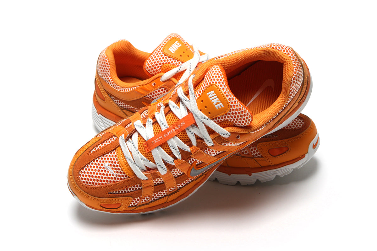 Nike | P-6000
Style # HQ3641-886
Color : Kumquat / Metallic Silver / Magma Orange