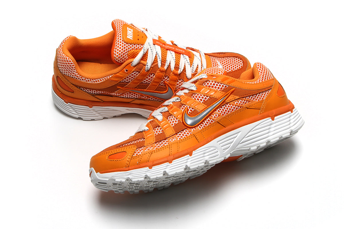 Nike | P-6000
Style # HQ3641-886
Color : Kumquat / Metallic Silver / Magma Orange