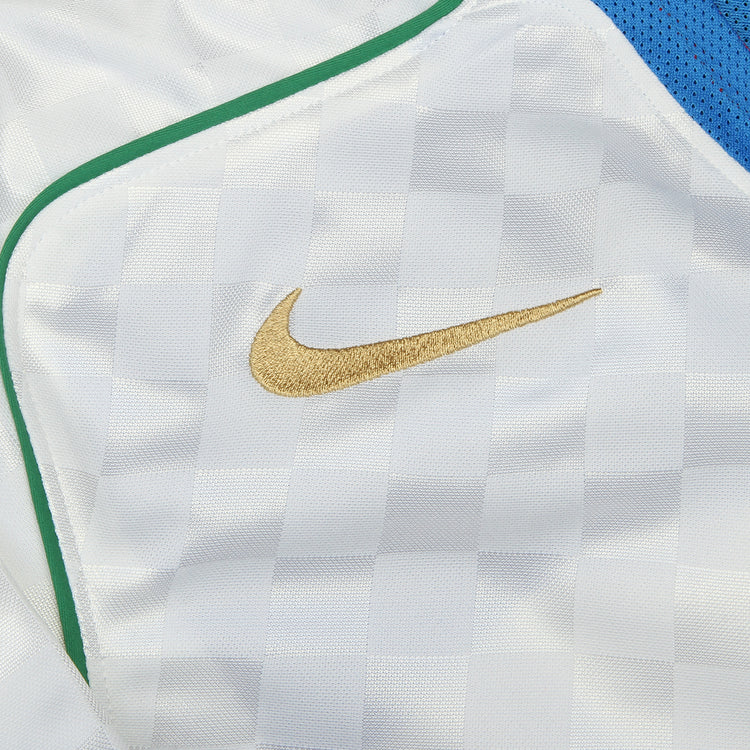 Nike - T90 Jersey
Style # IB4210-100
Color : White / Italy Blue / Sport Red / Metallic Gold