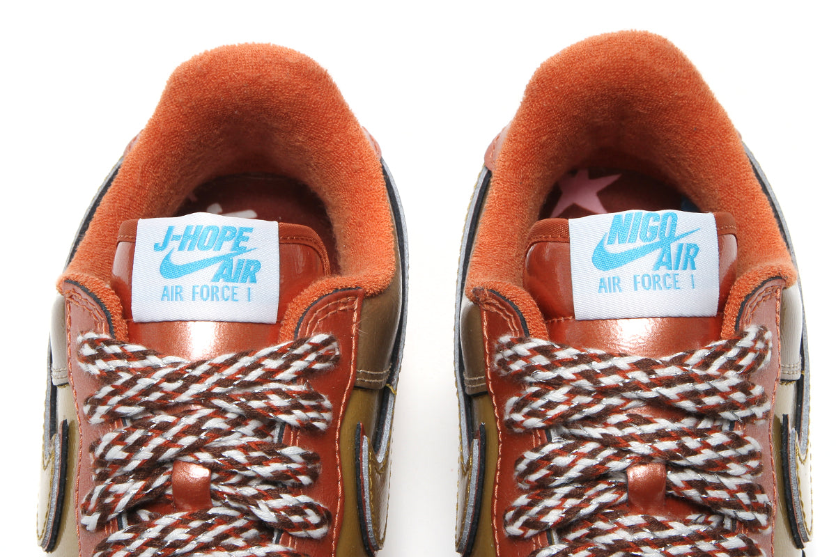 Nike - Air Force 1 '01 x NIGO x J-Hope
Style # IO8766-800
Color : Burnt Sunrise / Metallic Gold / Taupe