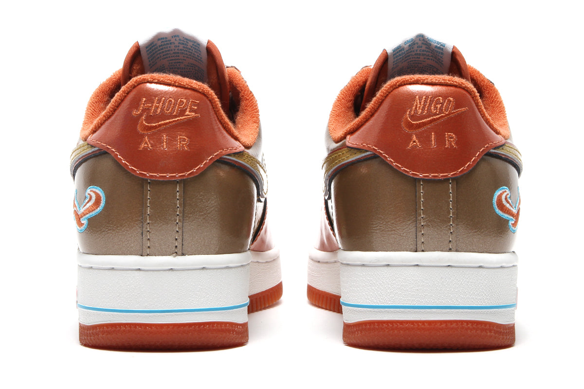 Nike - Air Force 1 '01 x NIGO x J-Hope
Style # IO8766-800
Color : Burnt Sunrise / Metallic Gold / Taupe