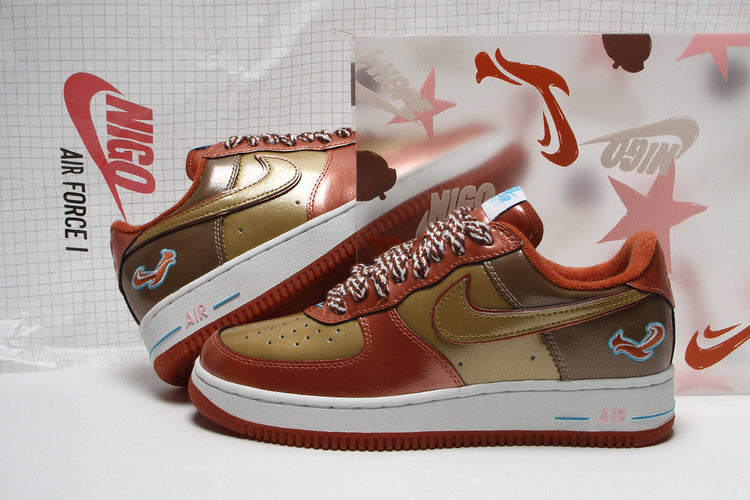 Nike - Air Force 1 '01 x NIGO x J-Hope
Style # IO8766-800
Color : Burnt Sunrise / Metallic Gold / Taupe