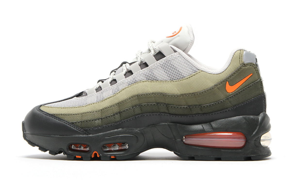 Nike - Air Max 95 Big Bubble
Style # IQ7128-003
Color : Light Bone / Safety Orange / Anthracite