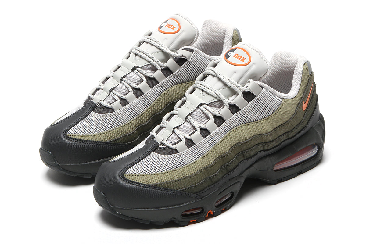 Nike - Air Max 95 Big Bubble
Style # IQ7128-003
Color : Light Bone / Safety Orange / Anthracite