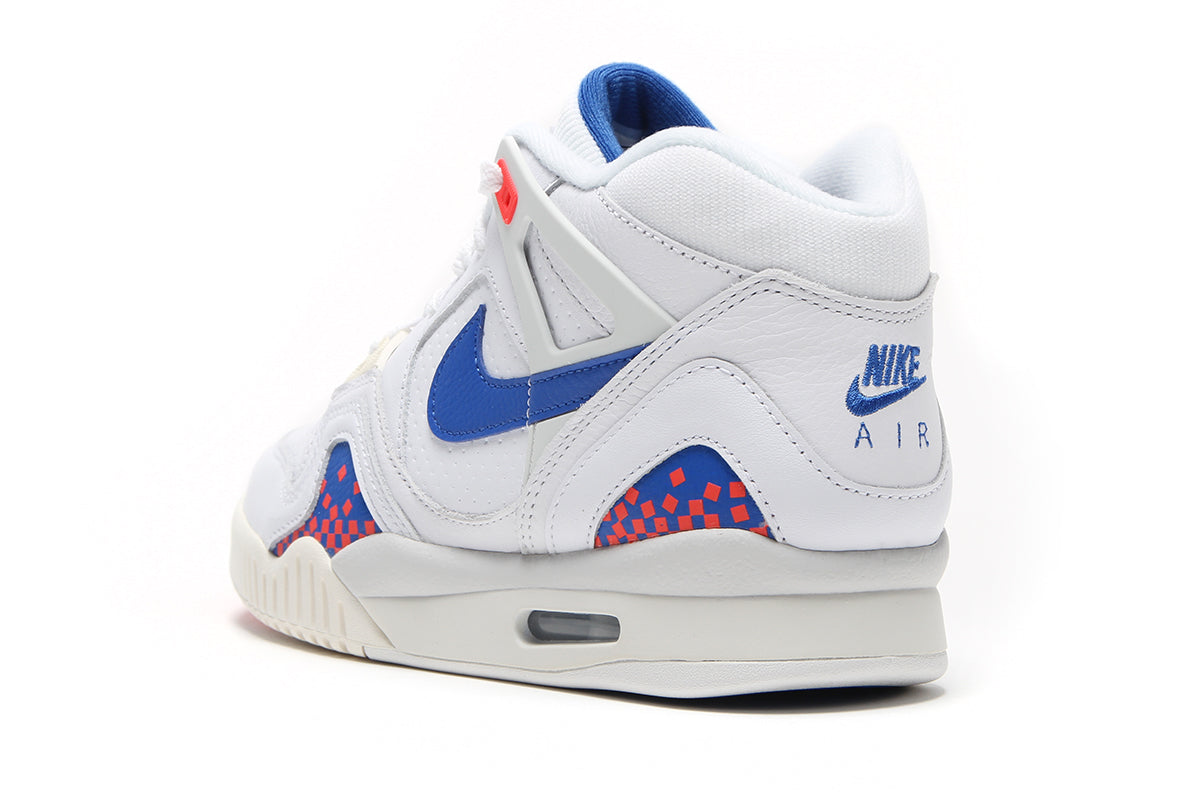 Nike - Air Tech Challenge II
Style # FZ9033-102
Color : White / Royal Blue / Laser Crimson