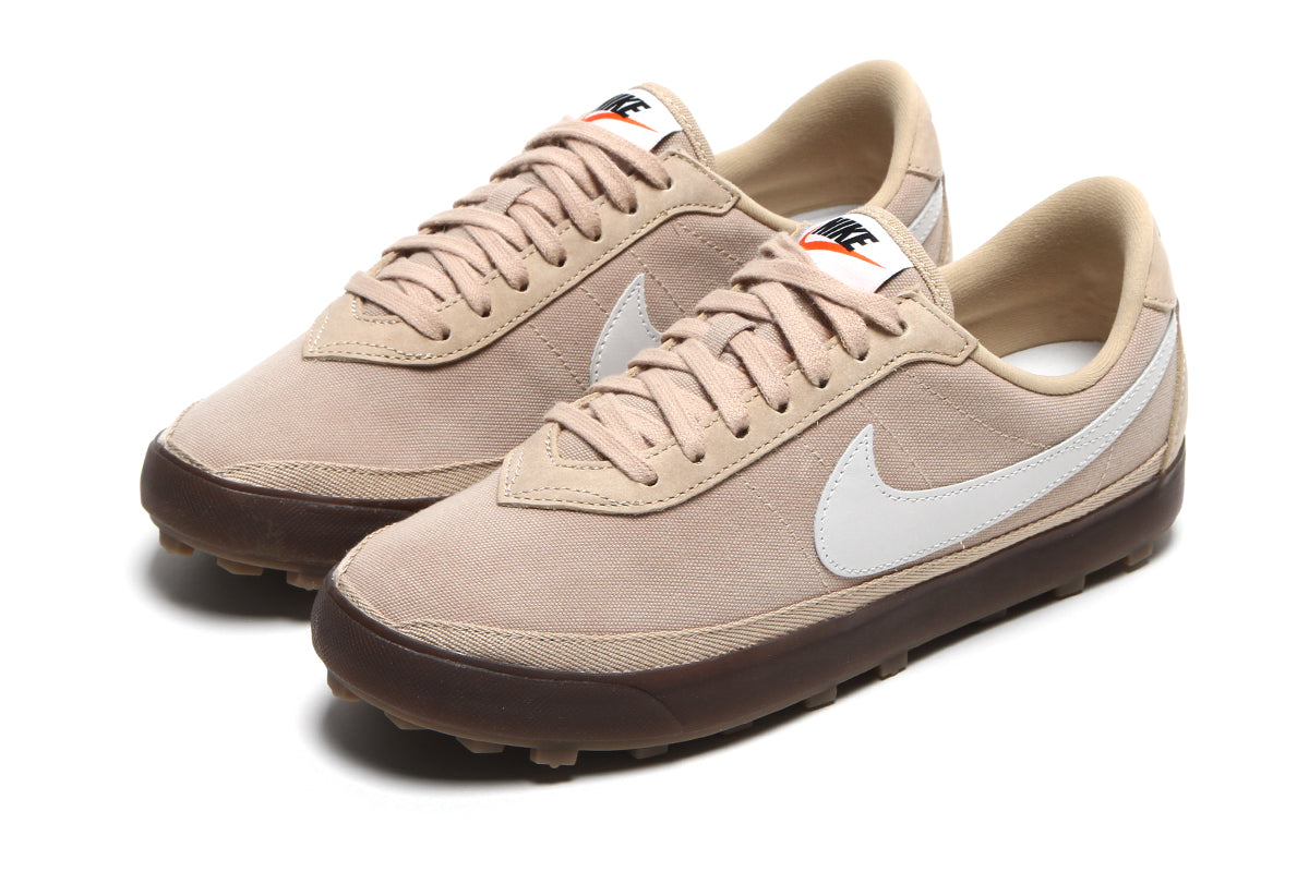 Nike - Astrograbber
Style # IO9281-202
Color : Linen / Medium Olive / Sail / Gum Dark Brown