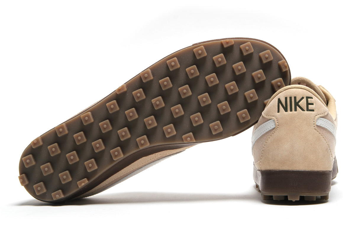 Nike - Astrograbber
Style # IO9281-202
Color : Linen / Medium Olive / Sail / Gum Dark Brown