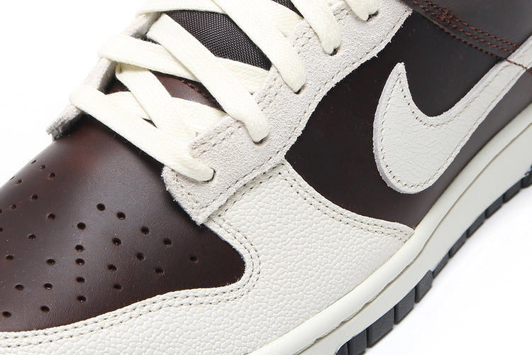 Nike - Dunk Low Retro
Style # IH7333-200
Color : Fauna Brown / Soft Pearl / Black