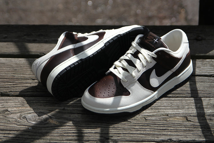 Nike - Dunk Low Retro
Style # IH7333-200
Color : Fauna Brown / Soft Pearl / Black
