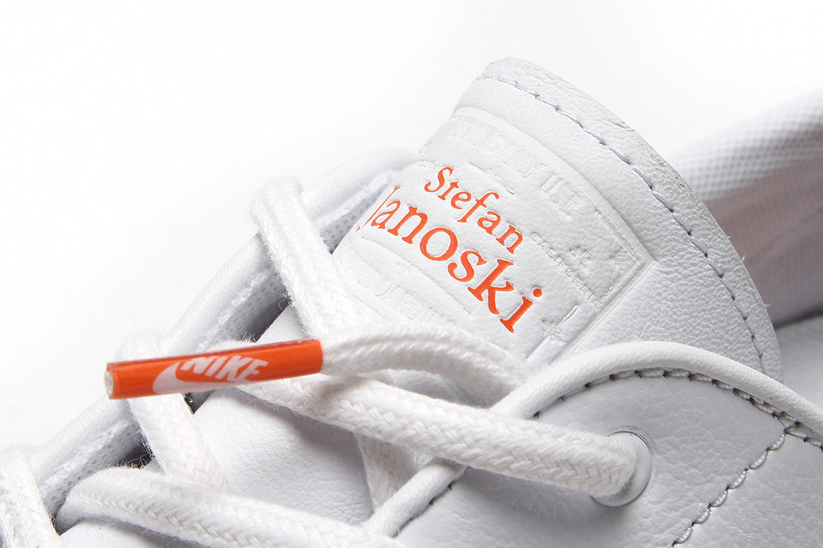 Nike sb janoski white and orange on sale