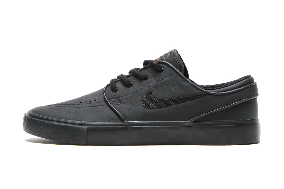 Nike sb janoski triple black leather best sale