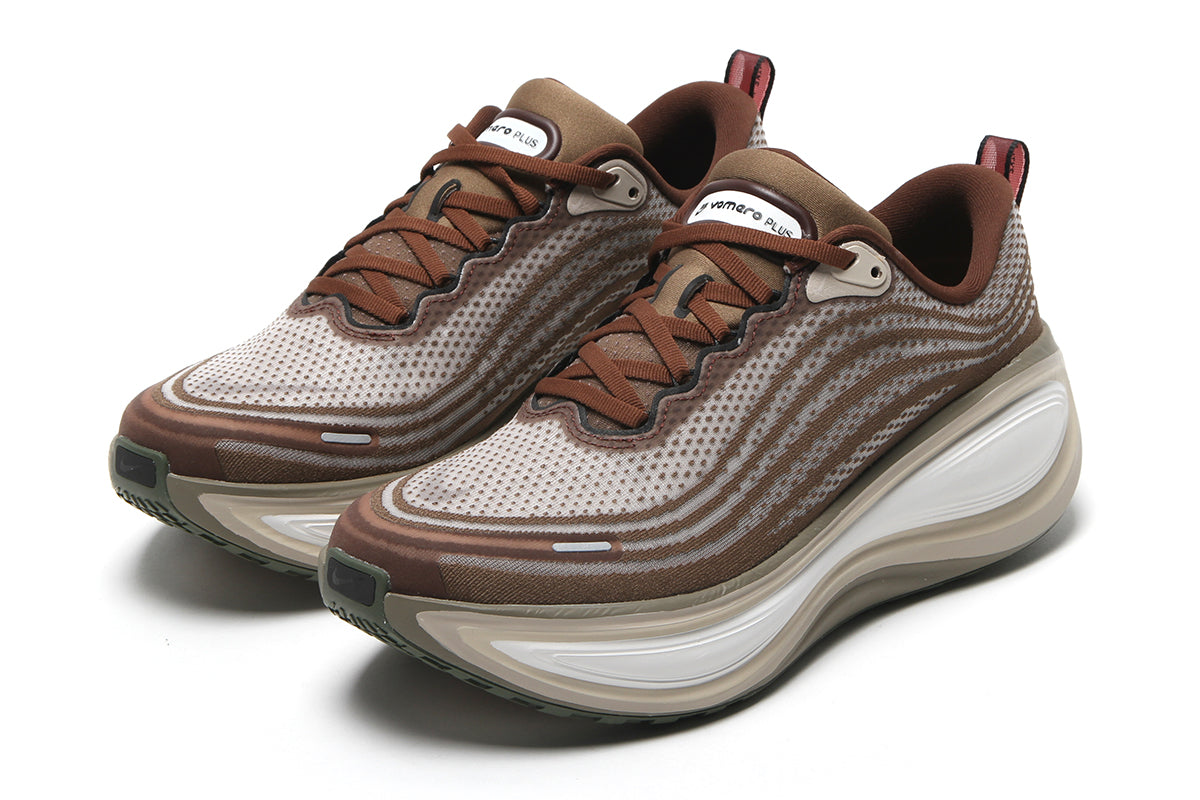 Nike - Vomero Plus
Style # IO4482-001
Color : Off Noir / Pecan / Phantom / Natural