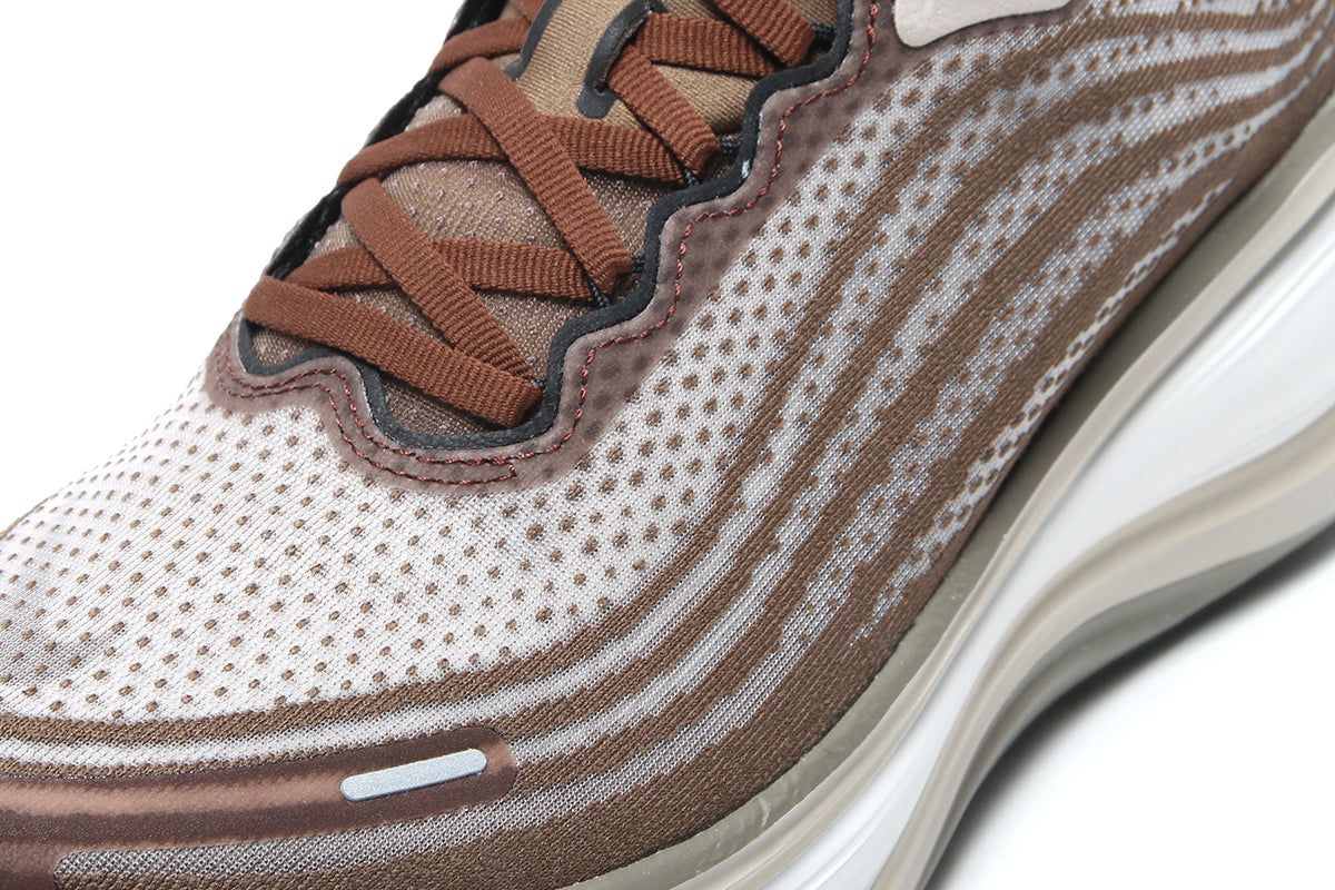 Nike - Vomero Plus
Style # IO4482-001
Color : Off Noir / Pecan / Phantom / Natural