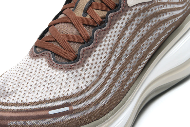 Nike - Vomero Plus
Style # IO4482-001
Color : Off Noir / Pecan / Phantom / Natural