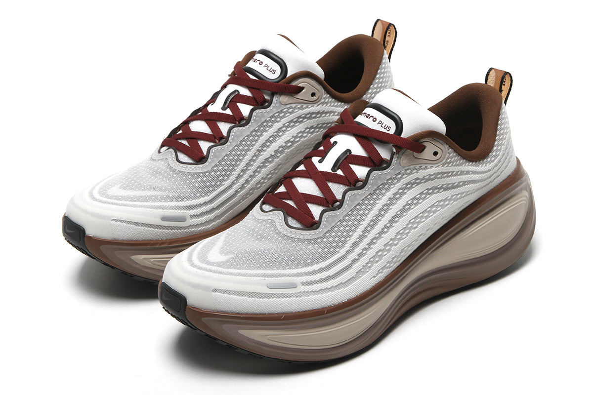 Nike - Vomero Plus
Style # IO4482-100
Color : Sail / Pecan / Caldera Brown / Black