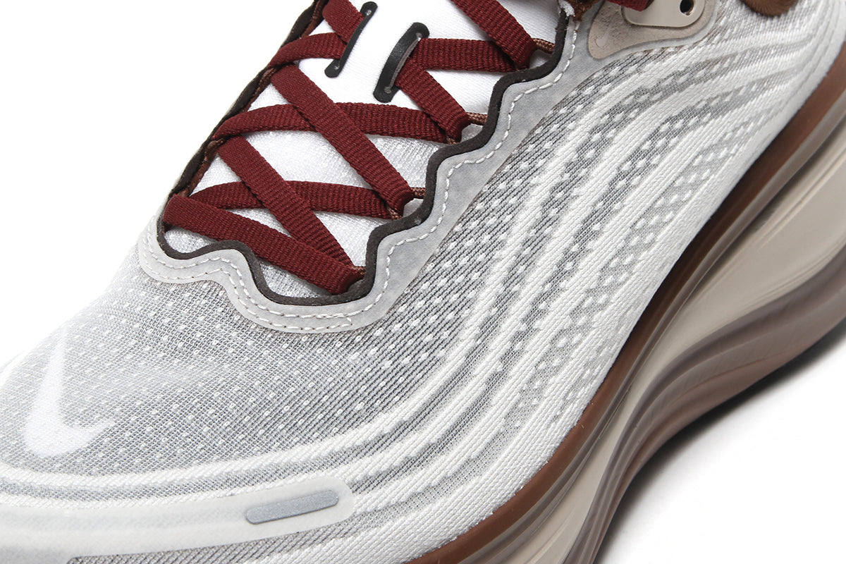 Nike - Vomero Plus
Style # IO4482-100
Color : Sail / Pecan / Caldera Brown / Black