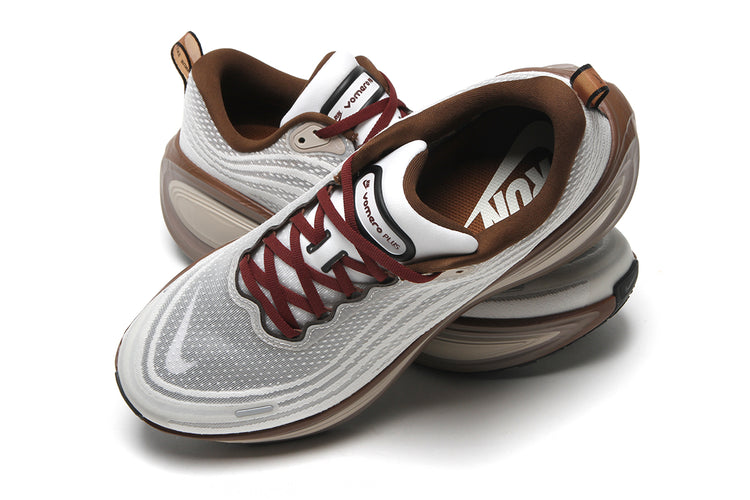 Nike - Vomero Plus
Style # IO4482-100
Color : Sail / Pecan / Caldera Brown / Black