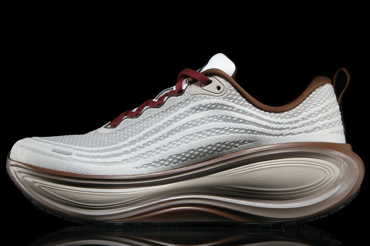 Nike - Vomero Plus
Style # IO4482-100
Color : Sail / Pecan / Caldera Brown / Black