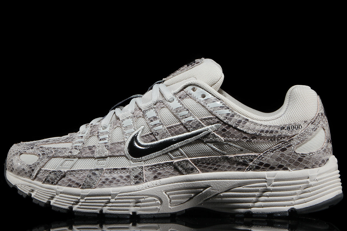 Nike - Nike P-6000 SE
Style # IH4451-002
Color : Light Bone / Black