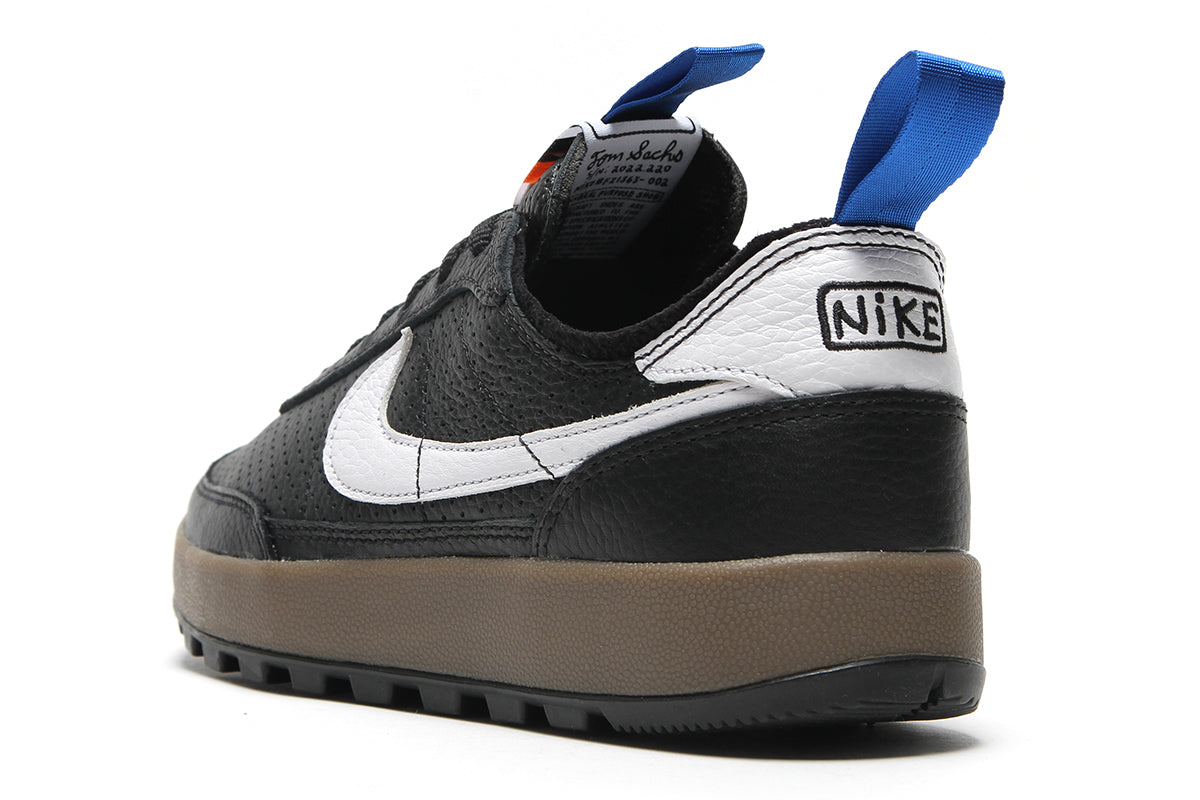 Nike - Women's General Purpose
Style # FZ1363-002
Color : Black / White / Team Royal / Team Orange
