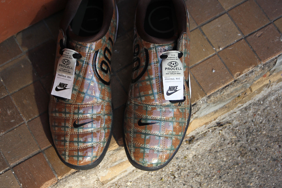 Nike - T90 x Procell
Style # IQ5794-237
Color : Baroque Brown / Black / Fir / Summit White