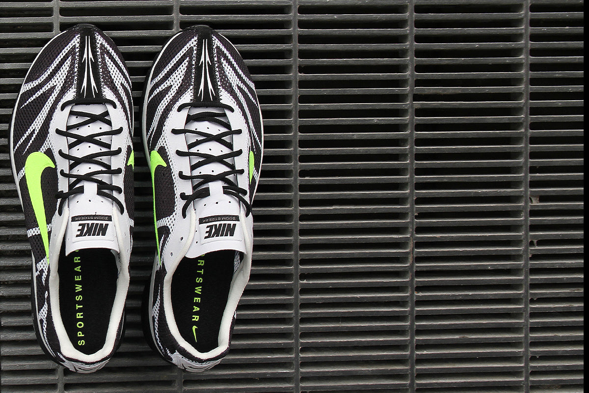Nike - Zoom Streak 3
Style # IQ8012-001
Color : Black / Volt / Summit White