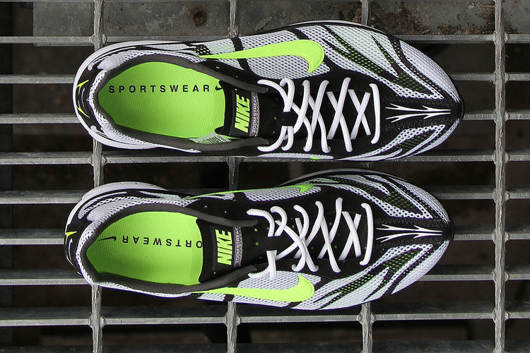 Nike - Zoom Streak 3
Style # IQ8012-100
Color : White / Volt / Flat Pewter / Black
