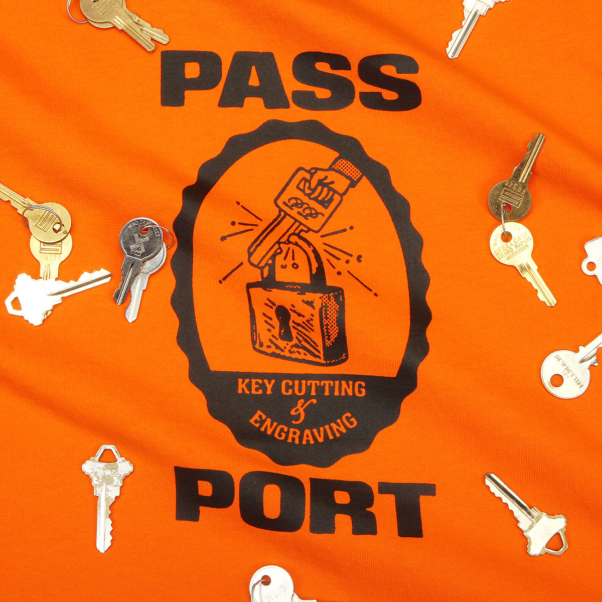 Passport - Herculocks T-Shirt
Color : Safety Orange