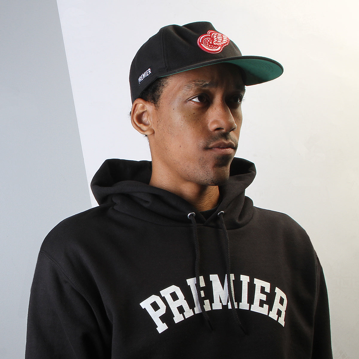 Premier | Red Wings Hat
Color : Black