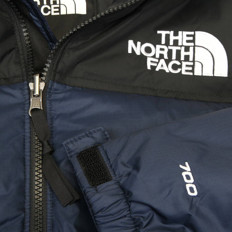The North Face - 1996 Retro Nuptse Jacket
Style # NF0A3C8DGOE1
Color : Summit Navy / TNF Black / Recycled Nylon Down