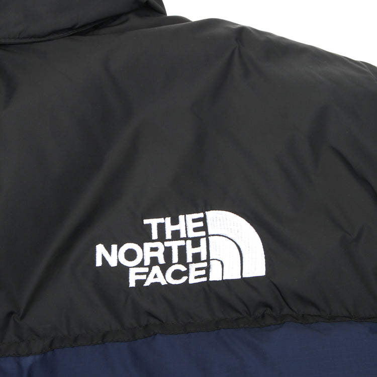 The North Face - 1996 Retro Nuptse Jacket
Style # NF0A3C8DGOE1
Color : Summit Navy / TNF Black / Recycled Nylon Down
